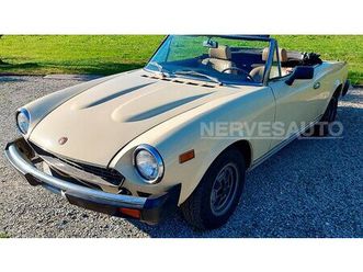 fiat 124 spider 2000 i.e. (1980) — avorio • interni biscotto a vendre