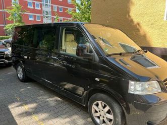 volkswagen t5 o-caravelle, 2.5l; schwarz; weiße leder...