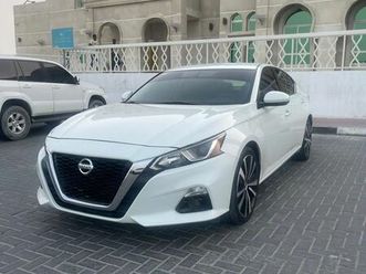 nissan altima sr ( 2022 model ) in white color gcc specs this has done a kilometer of 30,000 km