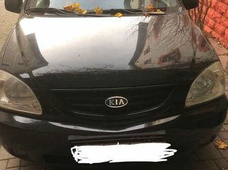 kia carens 1,8