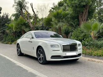 rolls-royce wraith 2015 rolls royce wraith | gcc specs | 6.6l v12 | 624 hp | 66k km | white/red | starlight headliner |