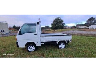 # 23 sold sold 1999 subaru sambar 4x4, ac, extra low geer.