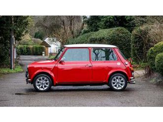 2000 rover mini rouge manuel, 4 vitesses conduite à droit...