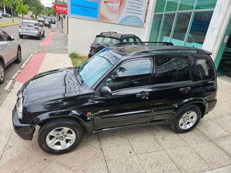 tracker mod. 2009 / motor 2.0 gasolina / tração 4 x 4 / teto solar / air bags / abs