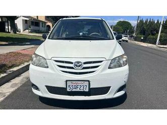 mazda mini van, an mpv with six seats