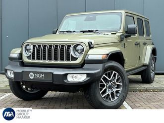 jeep wrangler unlimited 4xe 380 sahara apple carplay/android auto | achteruitrij camera | navigatie | direct leverbaar |