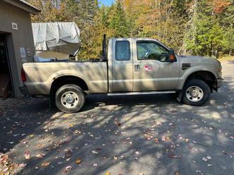 ford f250 super duty 2008 with 9’ boss plow