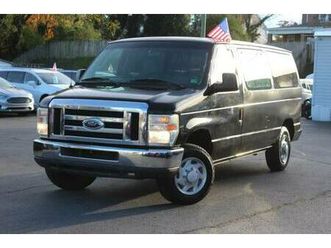 2009 ford econoline e-150 xlt low mileage comes with 90 days warranty