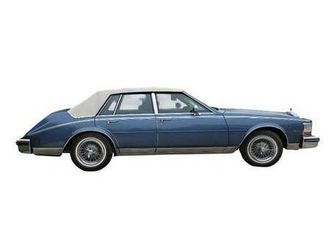 cadillac seville... excellent condition... bustle-back styling & more