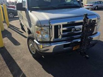 12 passenger ford e350 1-ton van.