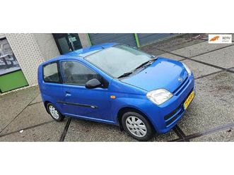 daihatsu cuore - 1.0-12v 100th anniversary