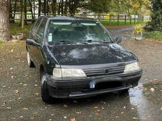 peugeot 106 noir / bleue