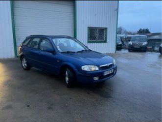 mazda 323 1.5 i 88cv