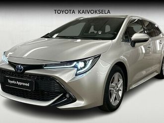 toyota corolla touring sports 1,8 hybrid prestige edition**lämpöpaketti / suomi-auto/toyota approved turva 12kk**