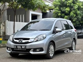 tangan pertama mobilio e at 2016 abu-abu muda metalik siap pakai