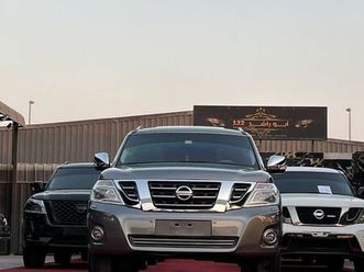 nissan patrol platinum se( 2015 model ) in gray color this has done a kilometer of 167000 km
