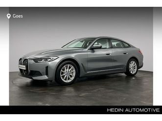 bmw i4 - edrive40 high executive 84 kwh | comfort access | achteruitrijcamera | elektrisch verwarmd