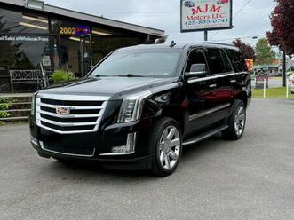 **2016** cadillac escalade luxury collection, built to impress!!