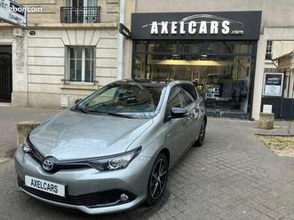 toyota auris hsd 136h bva executive premiere main clim auto bi-zones gps ecran tactile siege cuir caméra de recul radar de stationnement ar/ar régulateur de vit