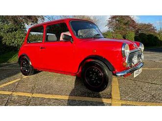 1993 rover mini sprite. 1275cc. flame red. only 23k. a vendre