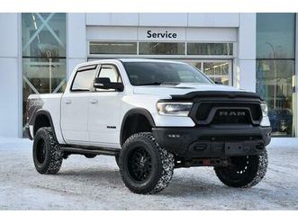 ram 1500 2021 rebel + lift kit 6 pouces + pneus 37 pouces toyo + toit pano + full cuir +
