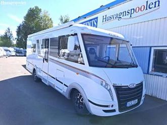 lmc i 715 explorer premium alde / låga långbäddar / toa bak