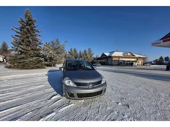 64000 km, nissan versa, 2010