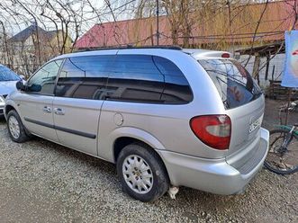 vînd chrysler grand voyager caracal