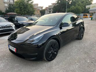 tesla model y швейцария 33000км