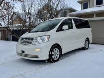 2003 toyota luxury van v6 awd 8 seater 54,000 kms
