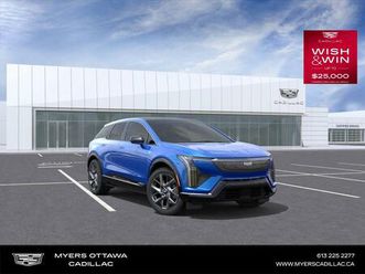 new 2026 cadillac optiq premium luxury premium luxury, awd, coastal blue on sky cool grey