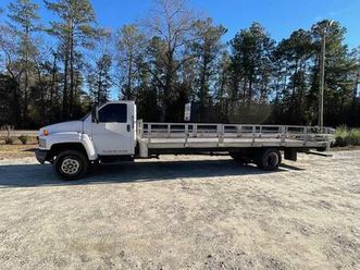 2005 gmc flatbed truck – v8 gas – 26k gvwr – runs good