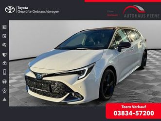 toyota corolla touring sports 2.0 hybrid black&white