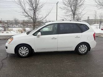 2011 kia rondo , 7 passagers , automatique , sièges cuir chauffants