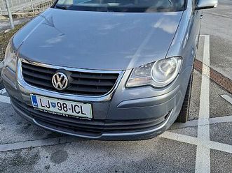 volkswagen touran 2.0 tdi avt. cross 103 140 dpf