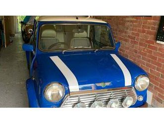 1997 rover mini bleu manuel, 4 vitesses conduite à droite...