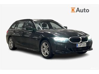 g21 touring 330e xdrive a charged edition