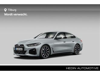 edrive40 high executive 84 kwh | comfort access | active cruise control | achteruitrijcamera | hifi system | voorstoelen verwarmd