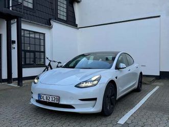 tesla model 3 standard range+ rwd 4d