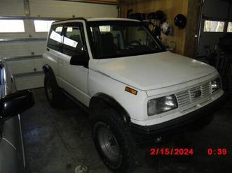 1995 geo tracker 4x4 2 dr hrdtop