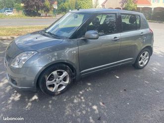 suzuki swift 1.3 ddis -5portes - 68 cv-4 chv-clim auto-jante alu-ct ok -1ere main- carnet suzuk