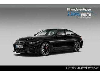 bmw i4 - m50 high executive 84 kwh | m-sport pro. | m-remsportschijven | achteruitrijcamera | stoel