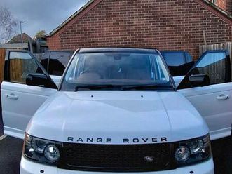 range rover sport, white, tan leather interior, tv & fridge, 22inch kahn alloys, tinted glass