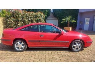 1996 opel calibra rouge manuel, 5 vitesses conduite à gau...