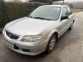 mazda 323 sedan, 2001 god.