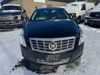 2014 cadillac xts with only 50,000 miles!