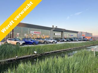 toyota yaris cross 1.5 hybrid first edition | navi | ecc | lm velgen | ad cruise | komt 17-1 binnen