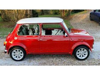1998 rover mini rouge manuel, 4 vitesses conduite à droit...