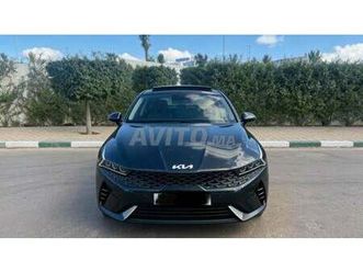 kia k5 hybride très bon état