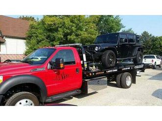 2015 ford f550 with 19ft jerr-dan car carrier tow truck 11k miles